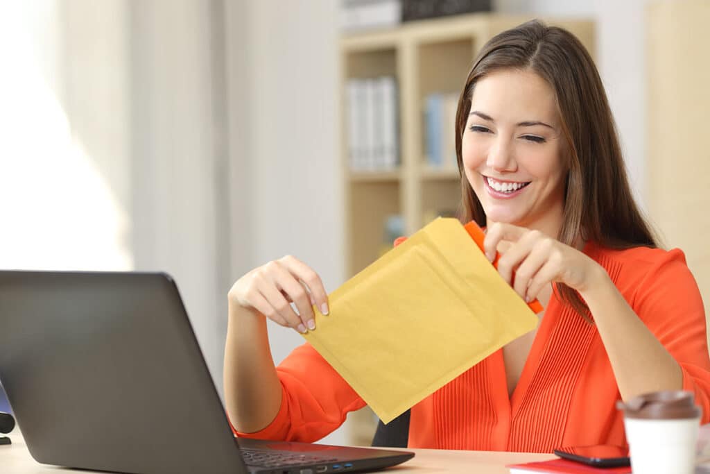 Girl Opening Mail